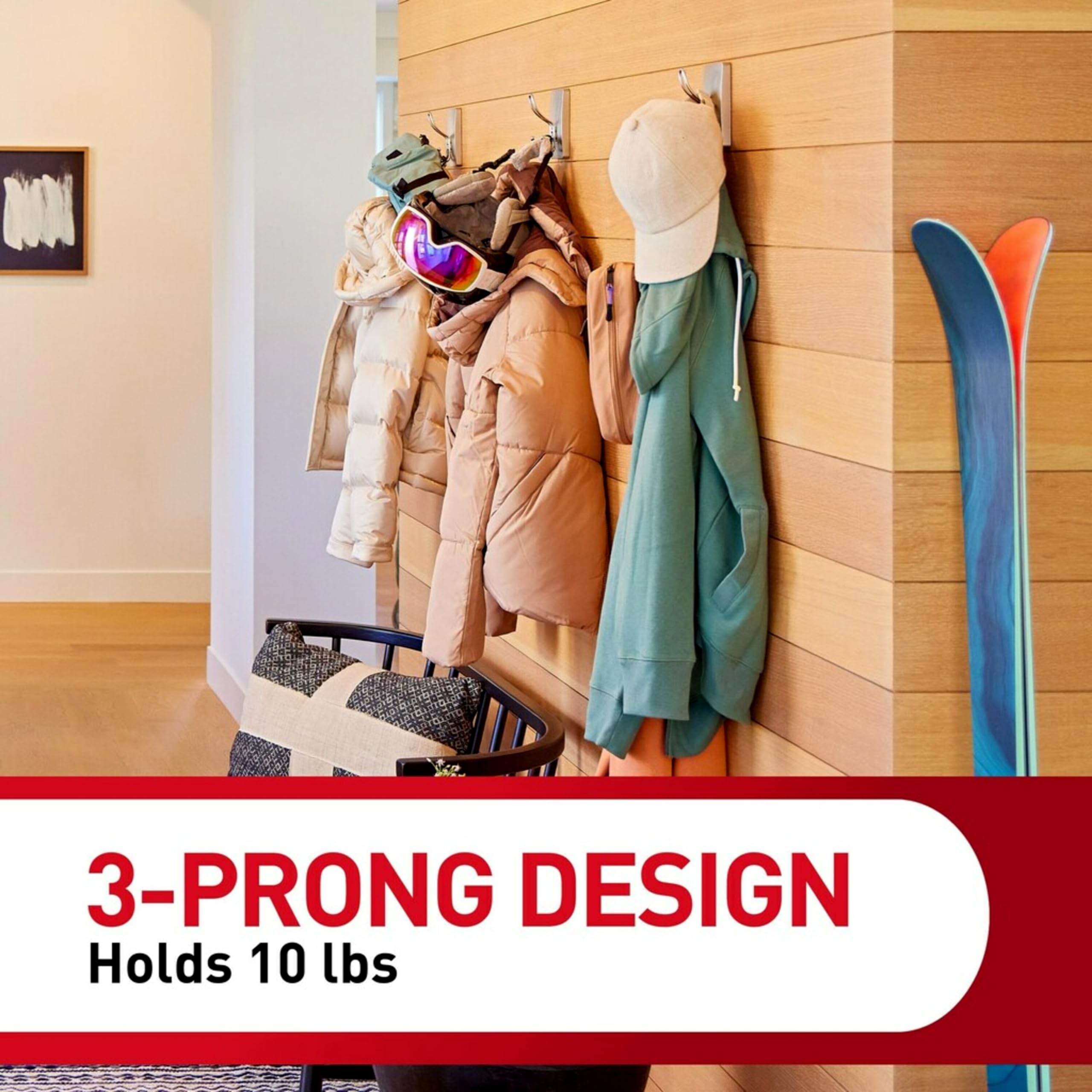 Command hooks in bathroom holding towels showing moisture-resistant decorative use
