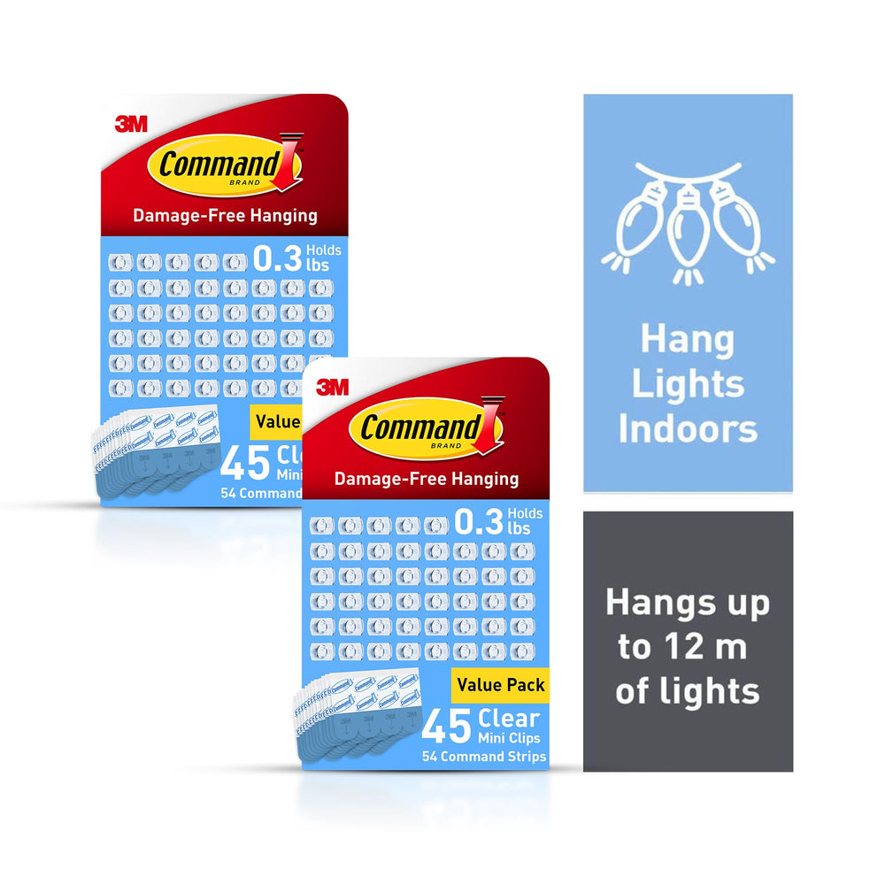 Command clips mounted on painted wall demonstrating damage-free hanging