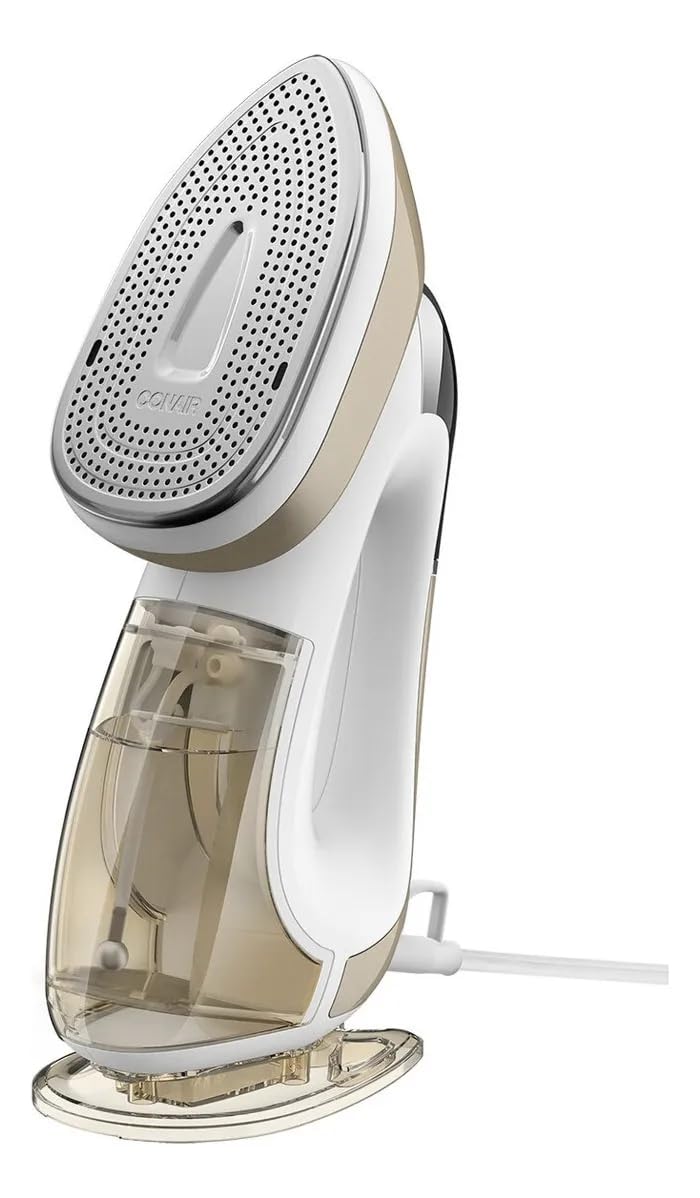 Conair beside suitcase showing compact size for travel convenience