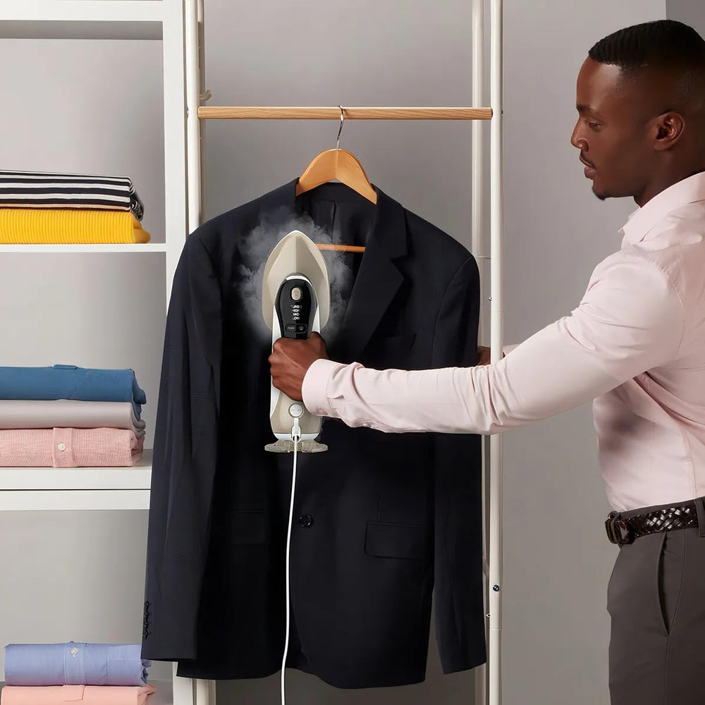 Conair steaming in use on hanging shirt quickly removing wrinkles