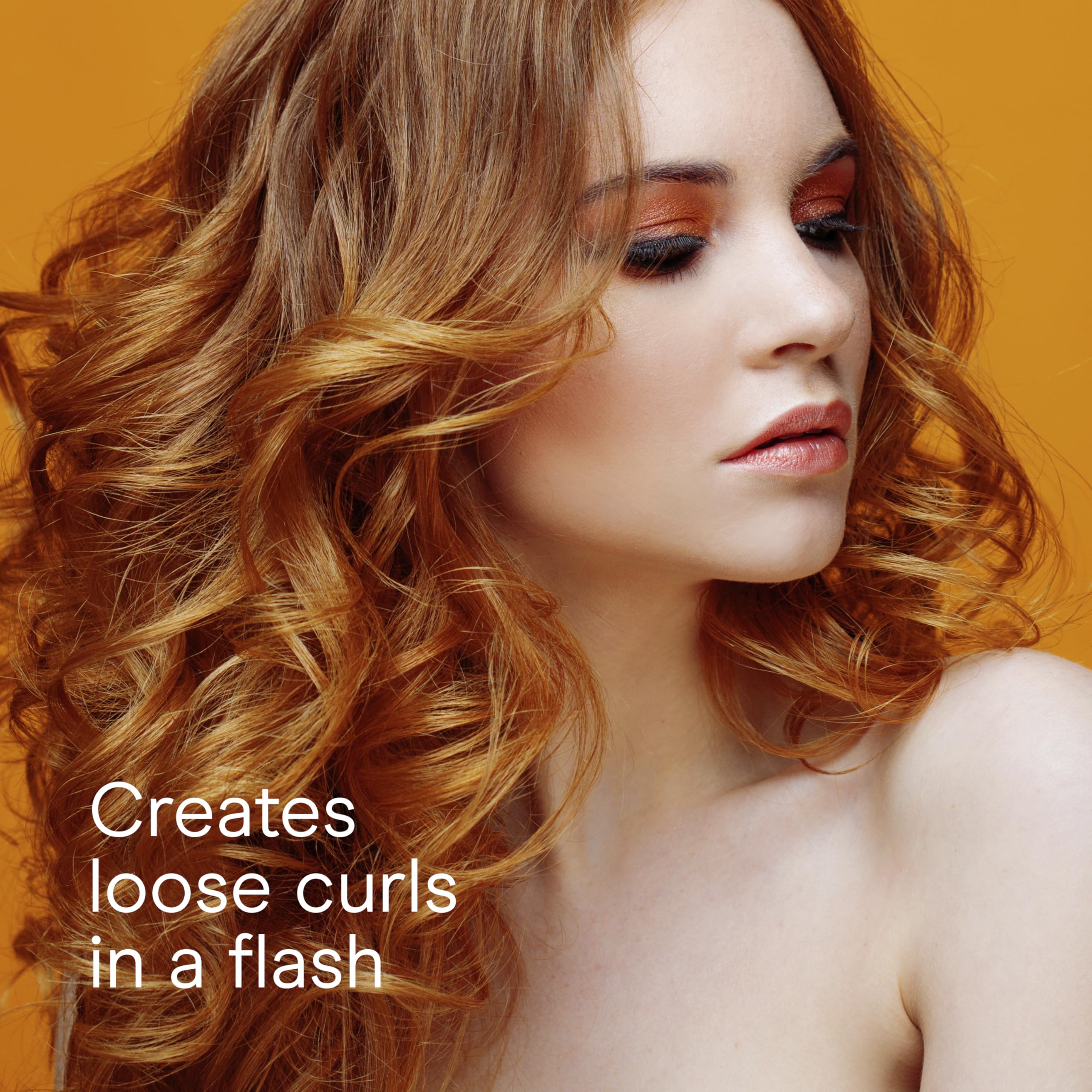 Conair curling iron in use on long hair creating loose, soft curls benefit