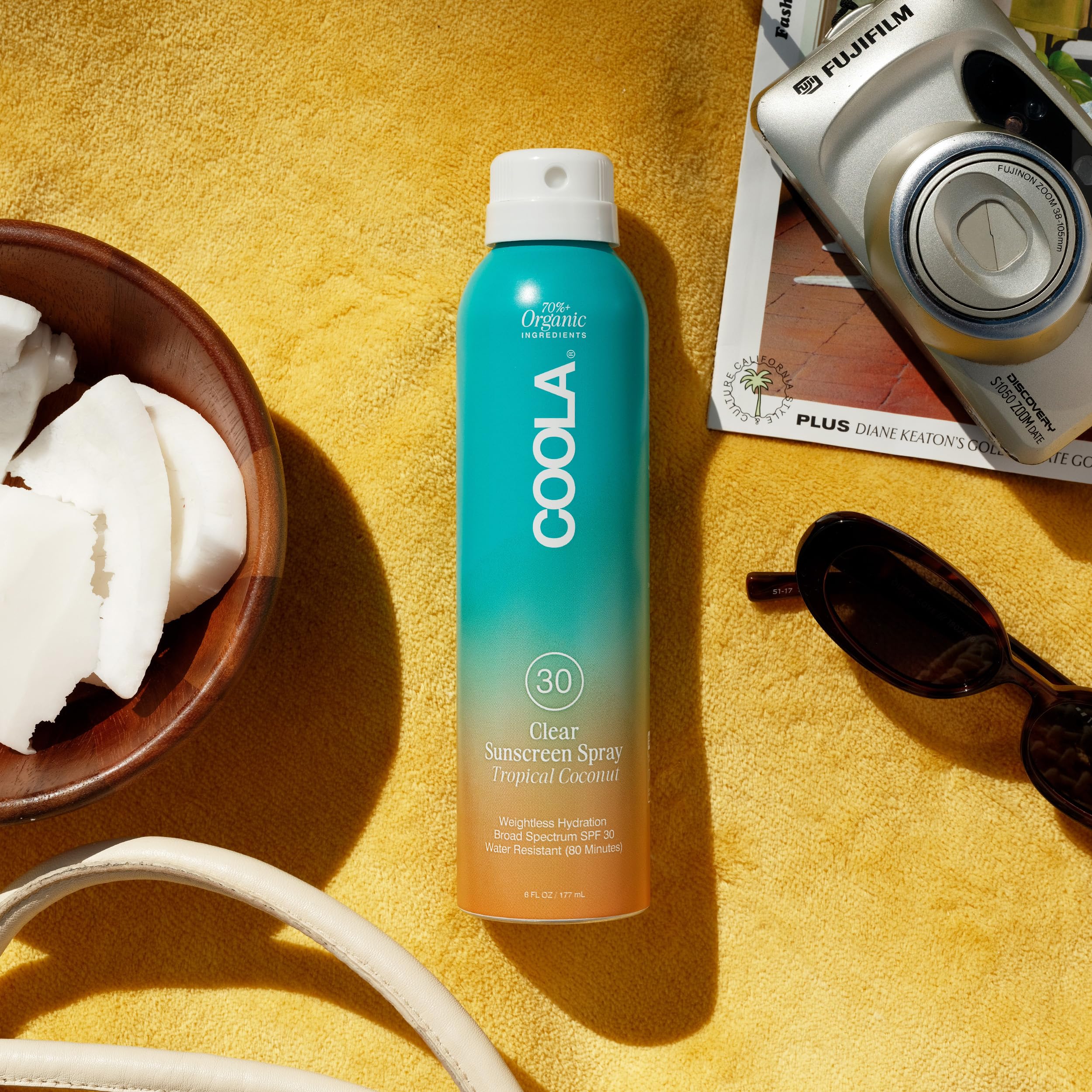 COOLA nozzle close-up illustrating continuous mist for full coverage