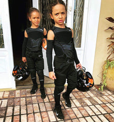 COOLOMG protector worn under jersey in play demonstrating mobility and unobtrusive protection