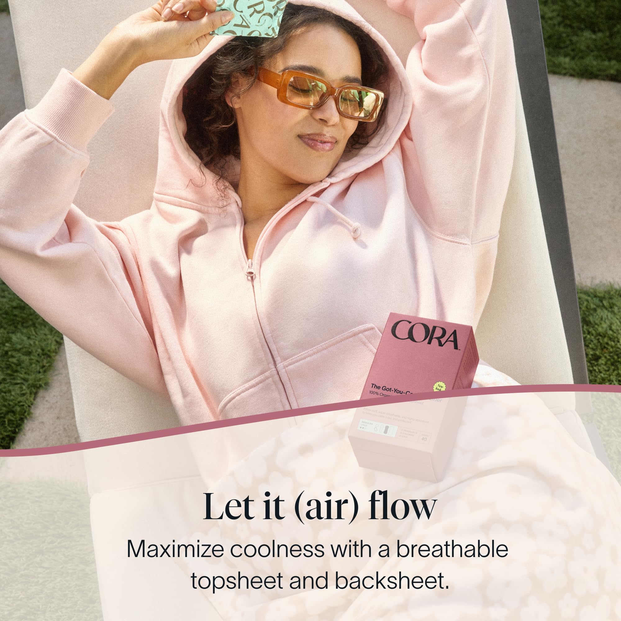 Cora individually wrapped liner opened for hygienic, discreet on-the-go use