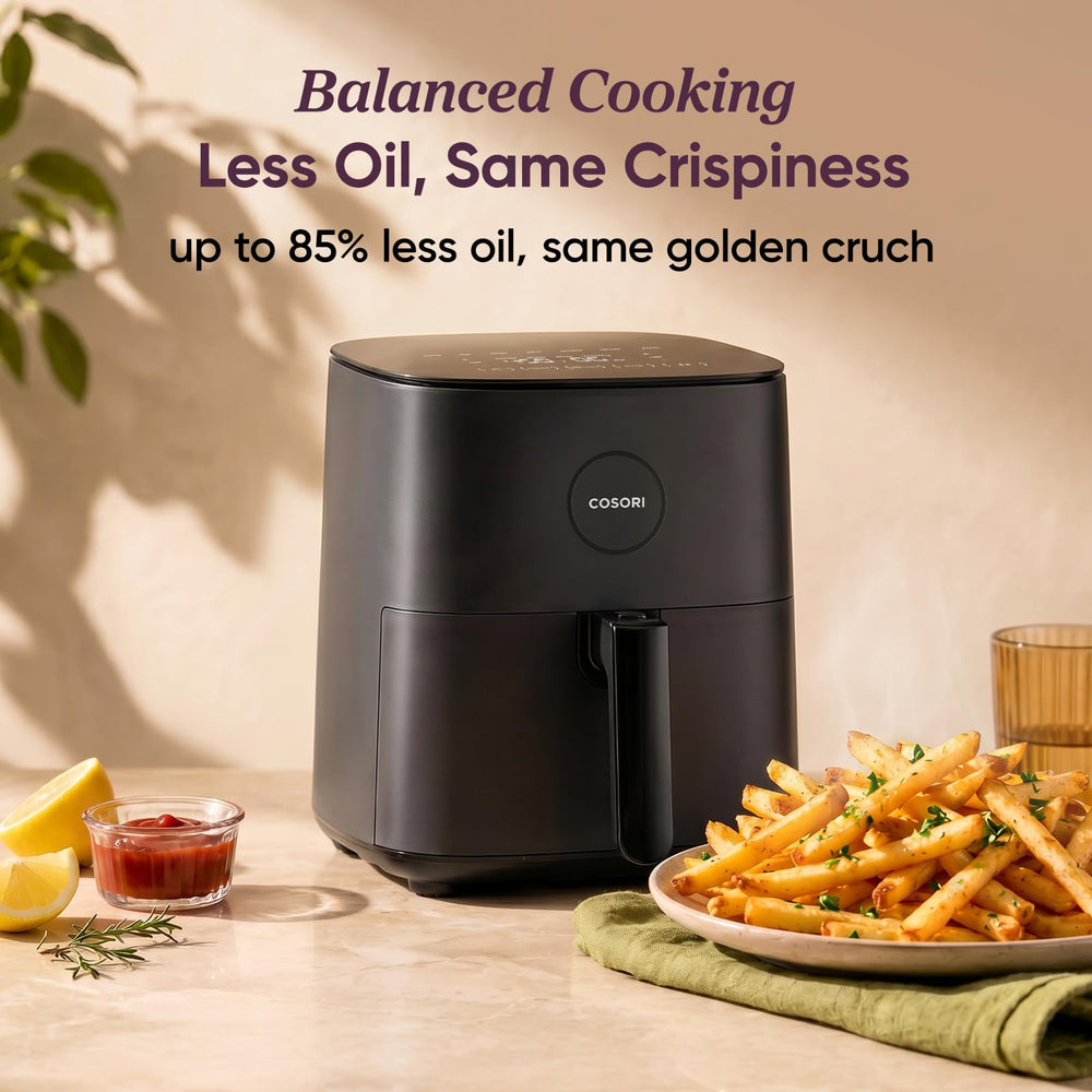 Cosori cooked meal inside basket illustrating crisp results with less oil