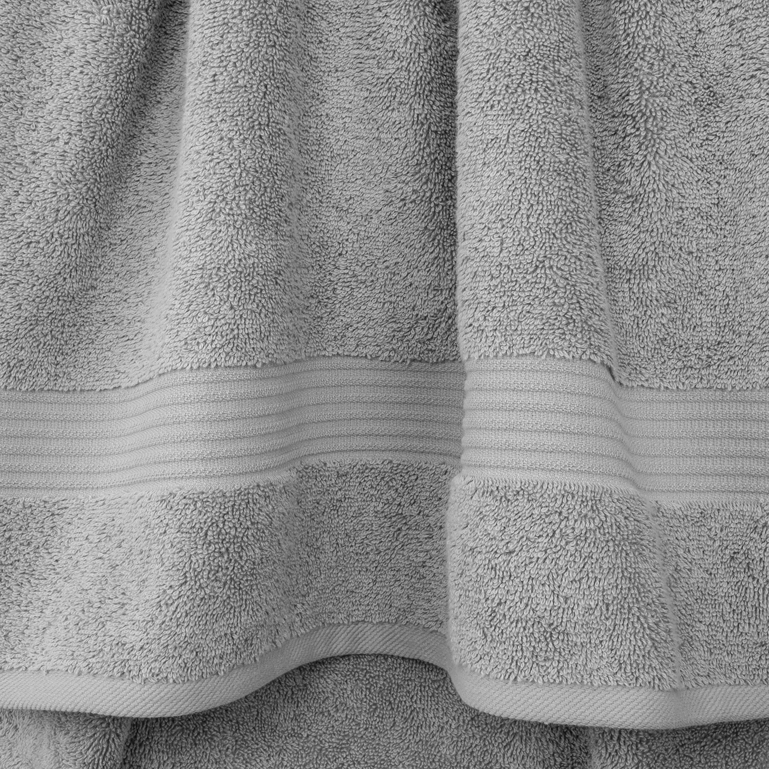 Cotton Paradise unfolded bath towel showing full size and wrap coverage benefit
