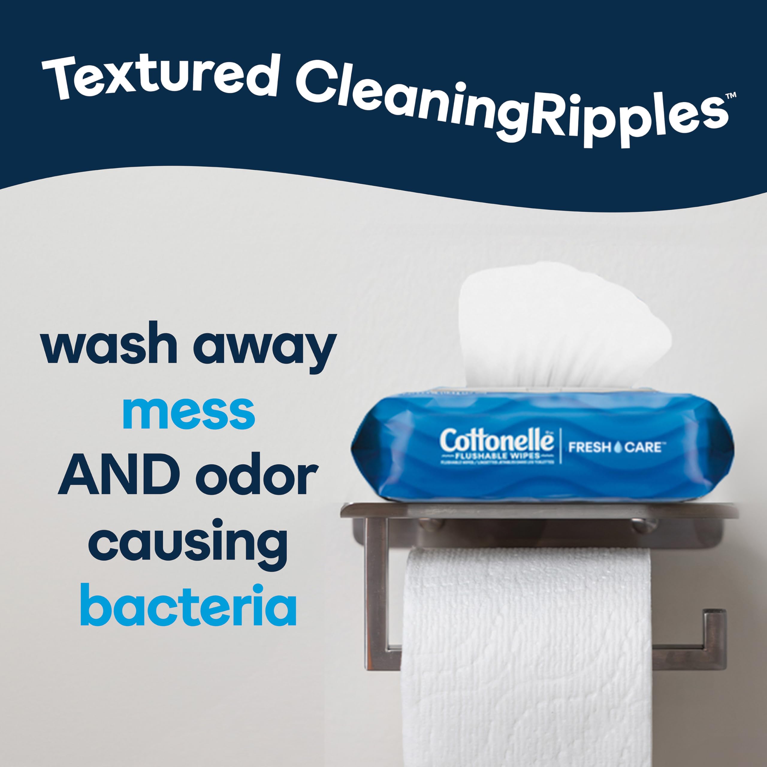 Person holding Cottonelle on-the-go pack demonstrating convenient portability