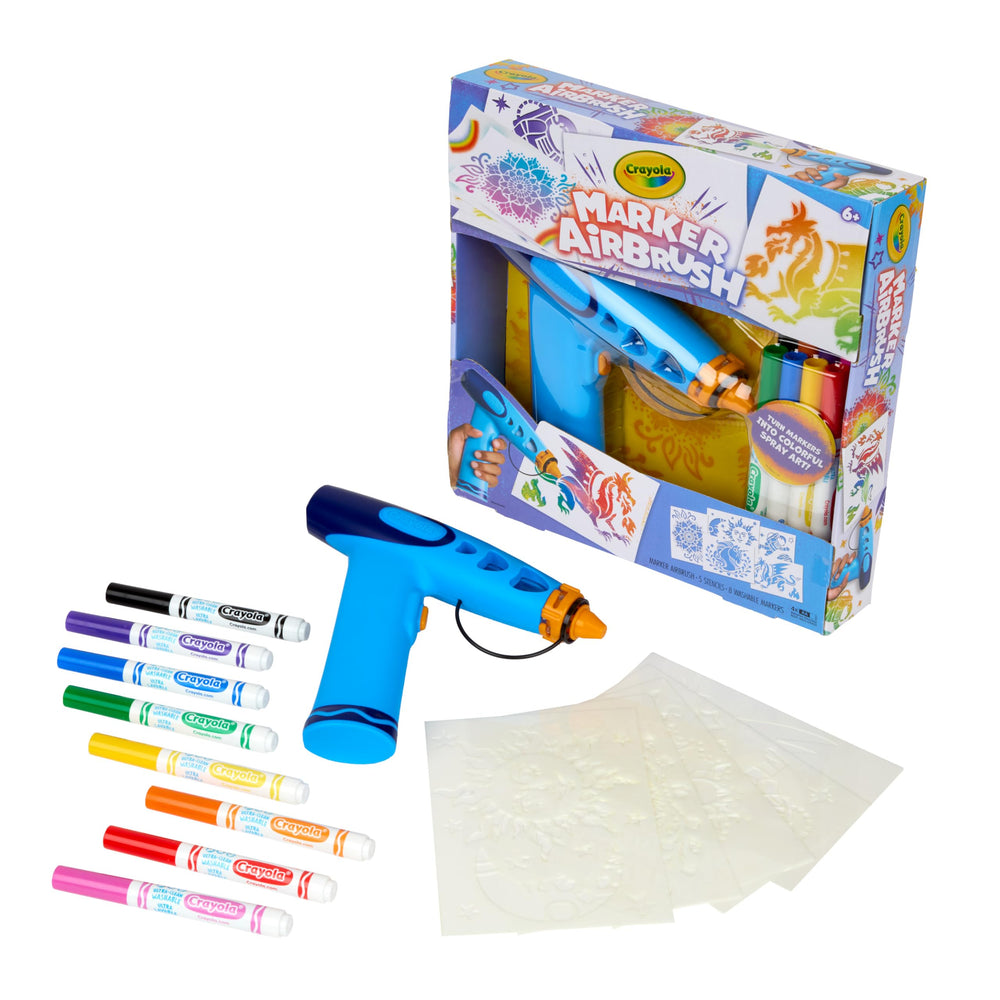 Crayola marker loaded into airbrush nozzle demonstrating quick insertion benefit
