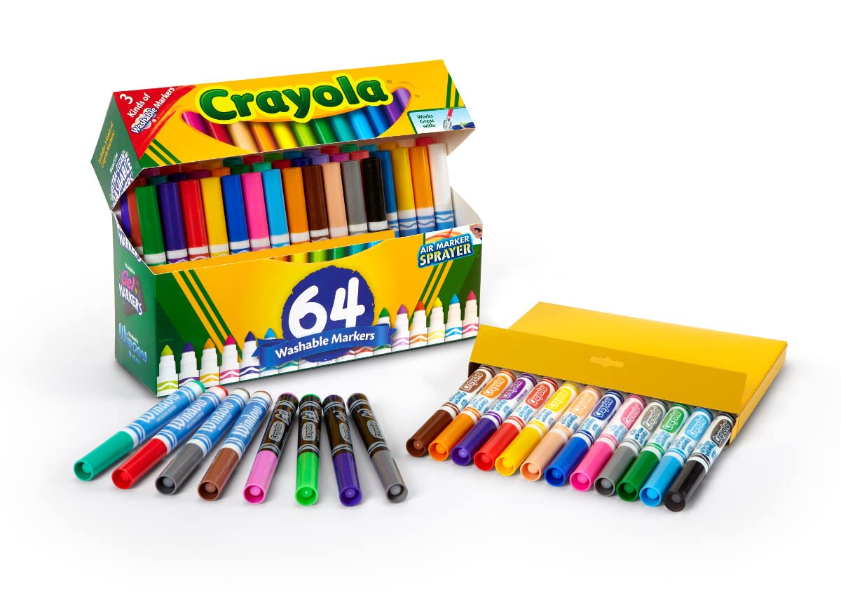 Child holding Crayola markers to show scale and comfortable grip