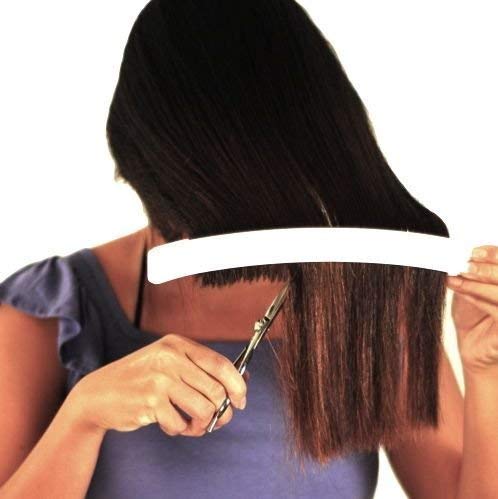 CreaClip in use creating layers on long hair demonstrating consistent angle benefit
