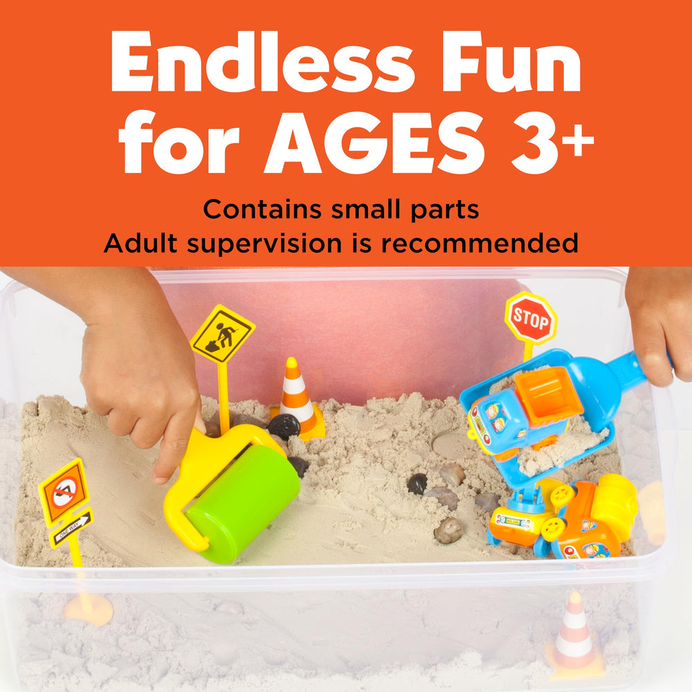 Creativity for Kids road signs, cones and pebbles laid out showing scene-building possibilities