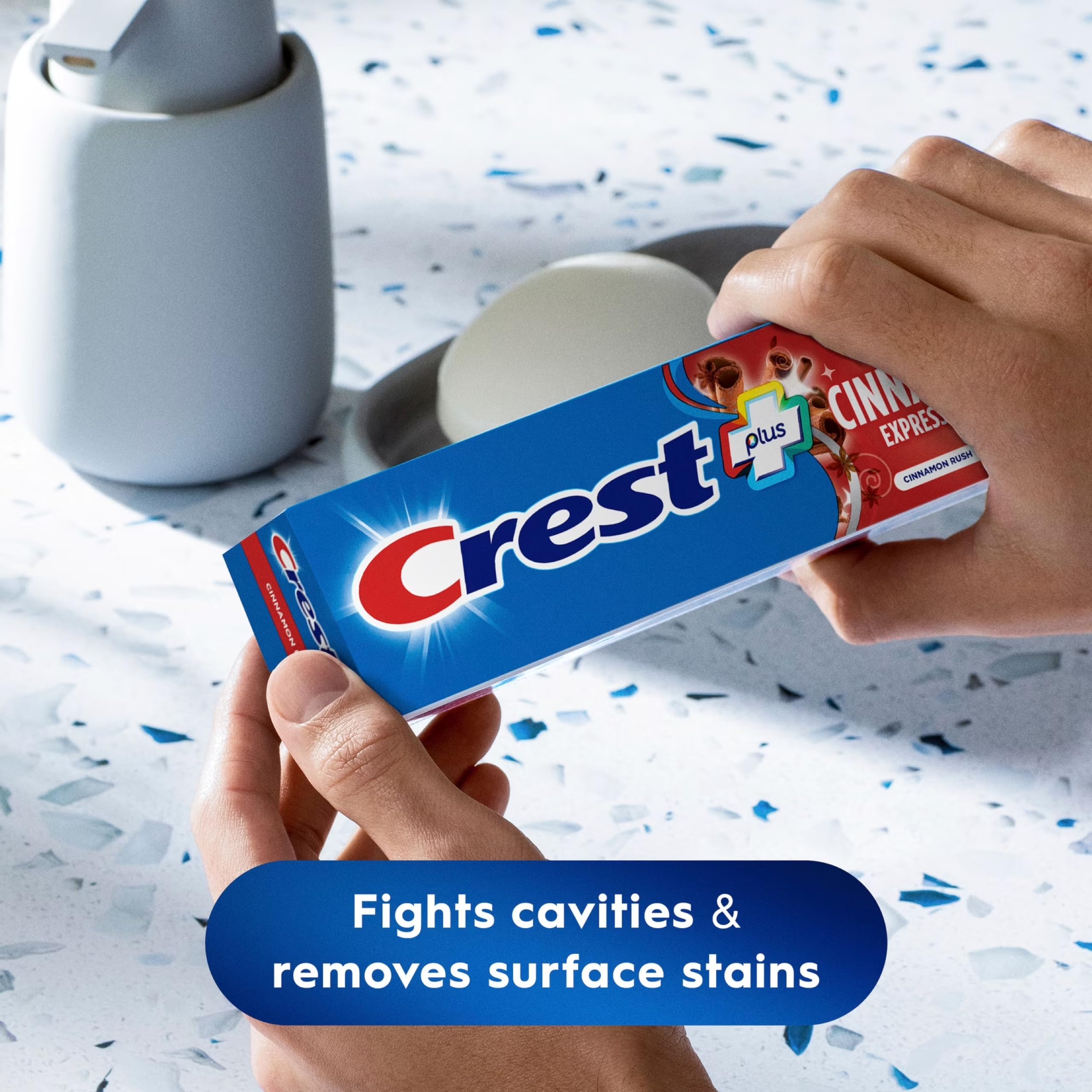 Close-up of Crest cinnamon paste texture displaying polish particles and smooth consistency for stain removal