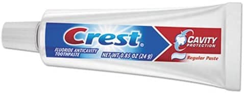Close-up of Crest toothpaste texture demonstrating smooth spread and even coverage