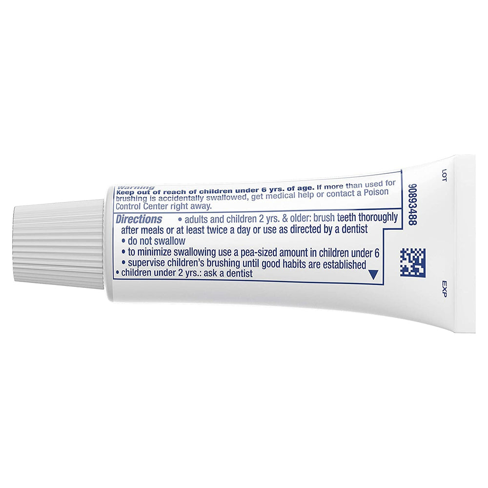 Crest travel toothpaste in a toiletry bag showing convenience and minty freshness