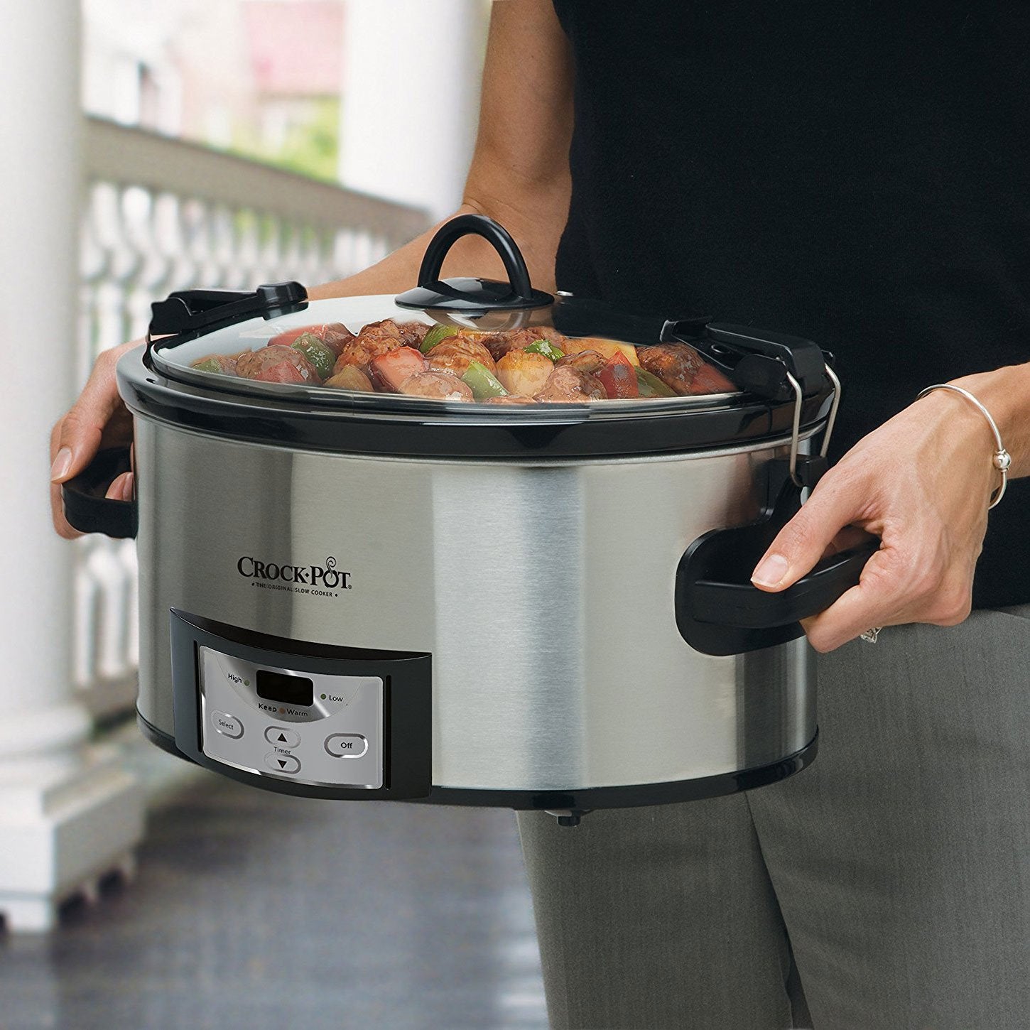 Crock-Pot locking lid closeup showing gasket seal for spill-free transport benefit