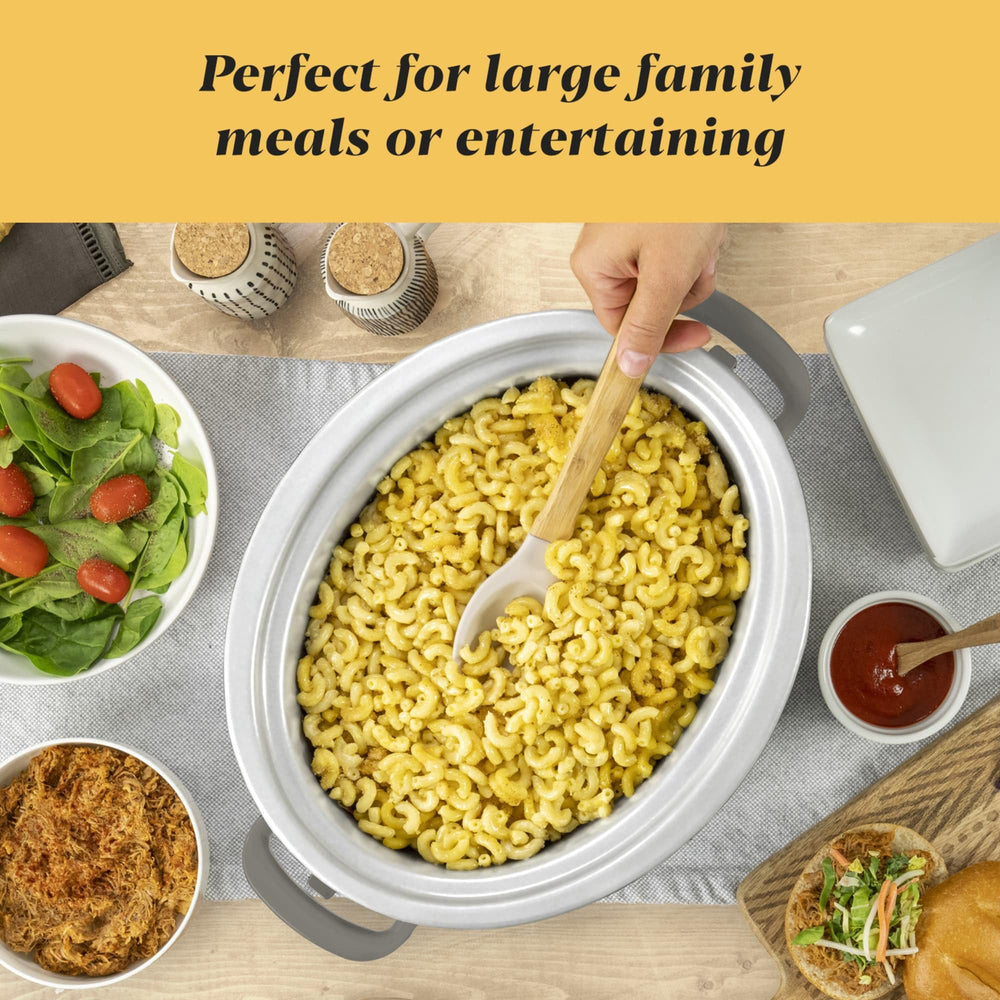 Crock-Pot beside common kitchen items to show 7-quart scale and family-sized serving ability