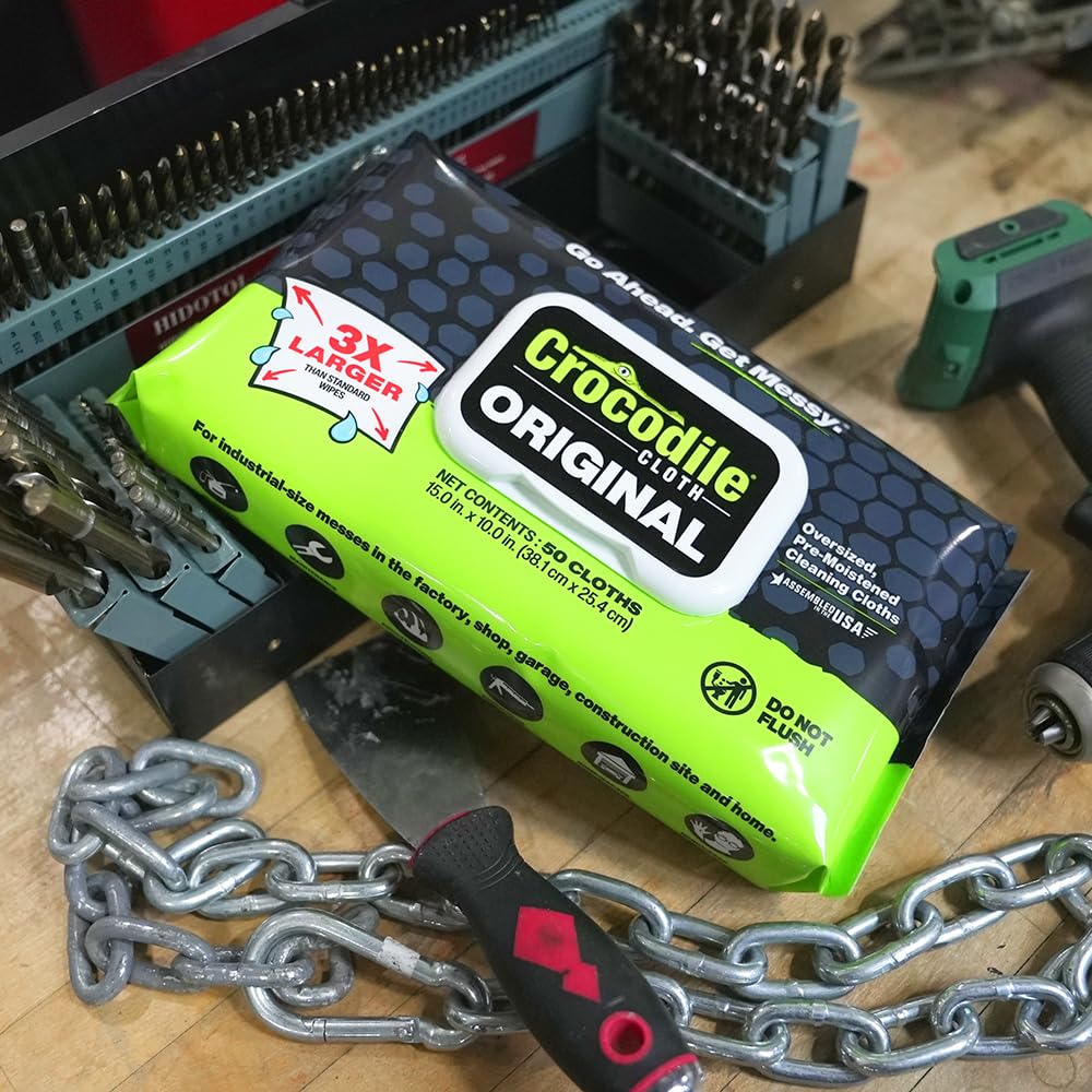 Crocodile Cloth used in garage setting cleaning engine parts, practical workshop solution
