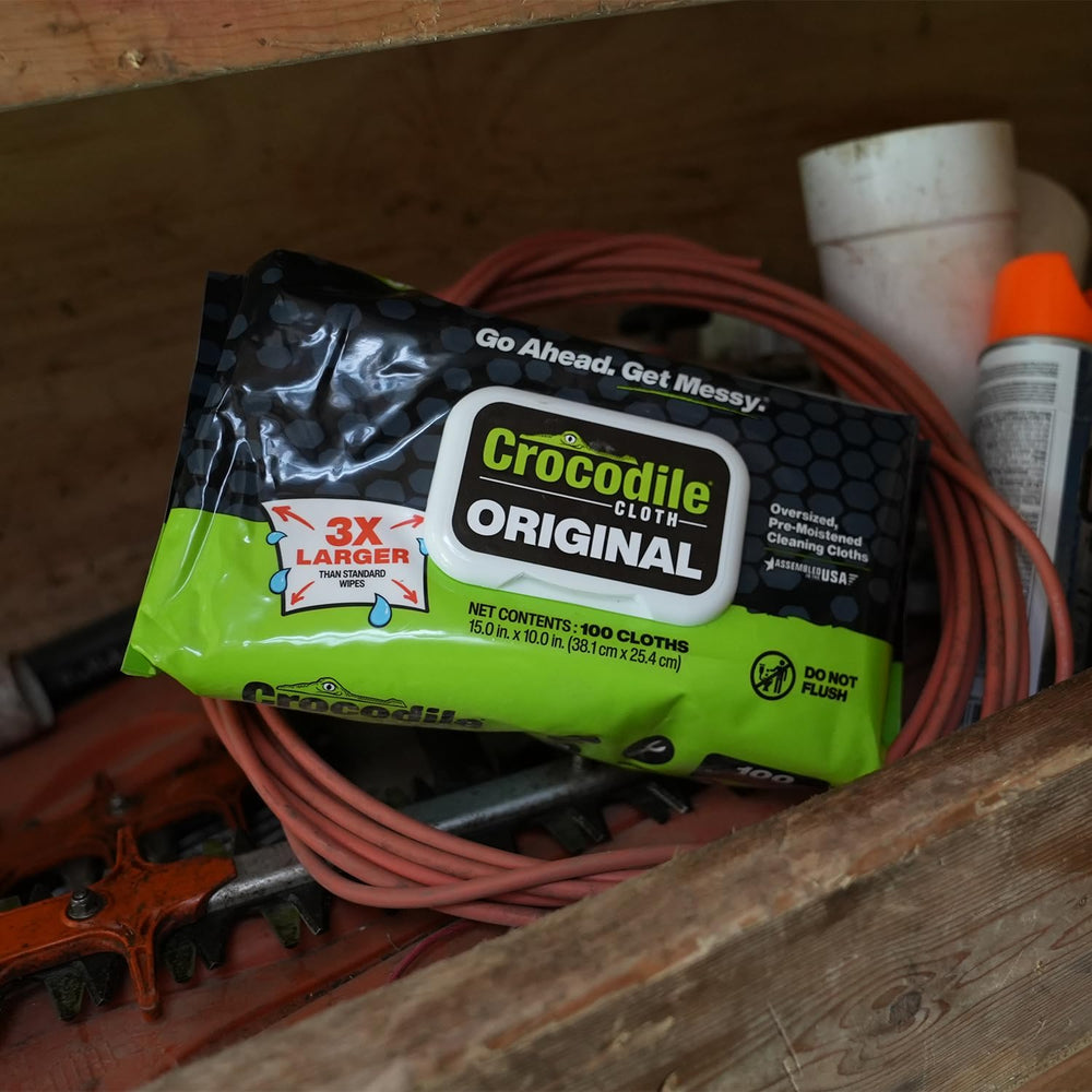 Crocodile Cloth wipe holding moisture outside tub, demonstrating long-lasting wetness