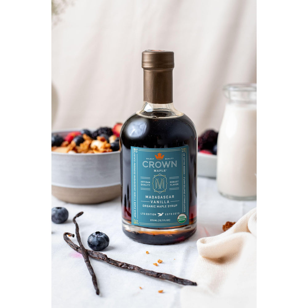 Crown Maple poured over pancakes in breakfast setting showcasing rich flavor and versatile use benefit