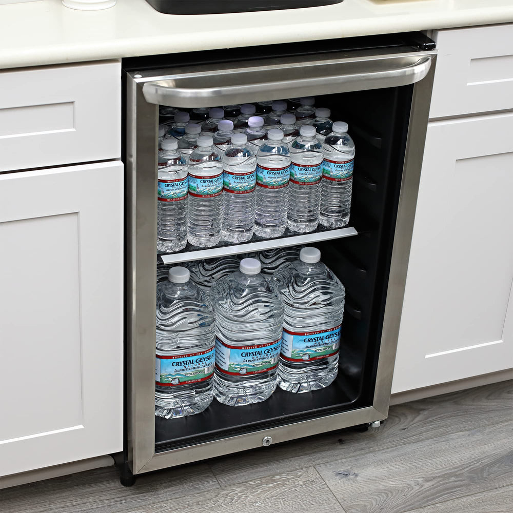 Crystal Geyser jug held by hand to show scale and easy handling for refilling