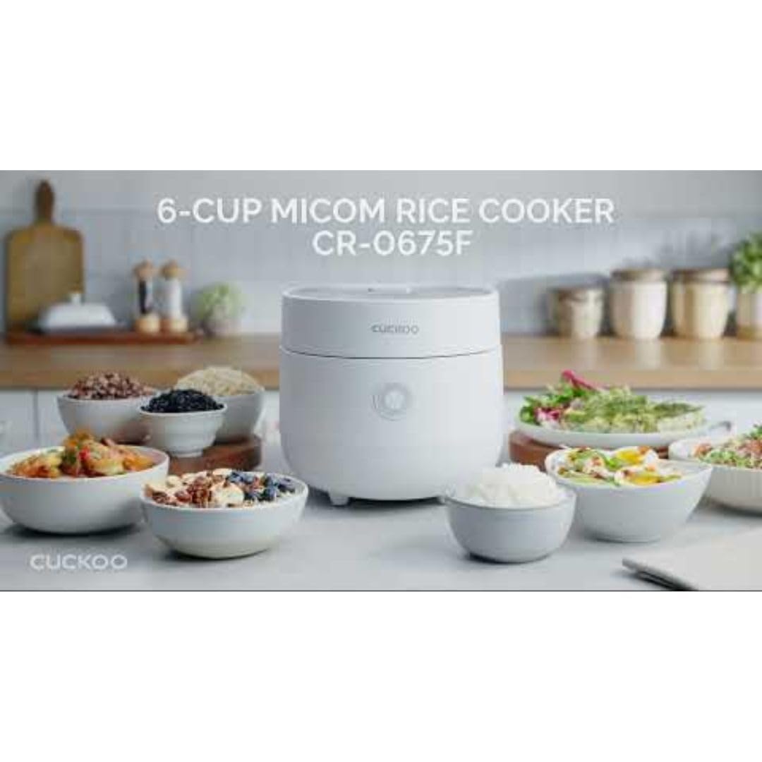 CUCKOO rice cooker open with removable inner lid visible for simple cleaning benefit