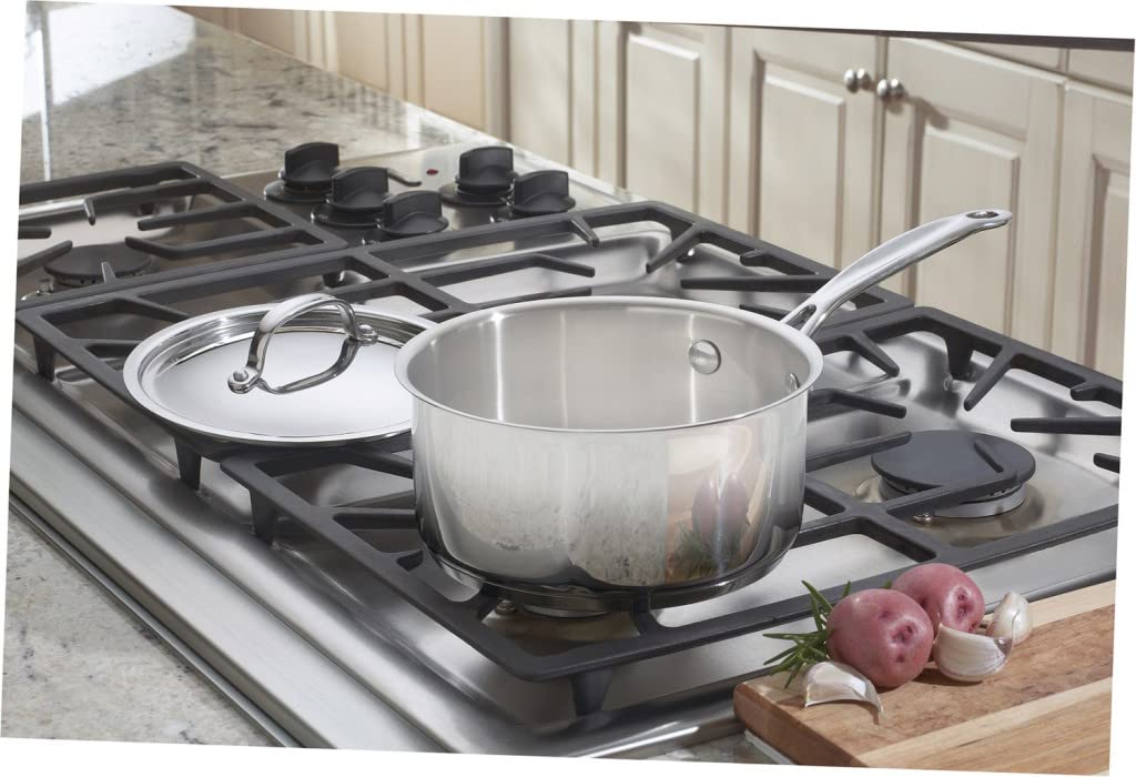 Cuisinart base close‑up showing encapsulated aluminum core, offering fast even heating benefit