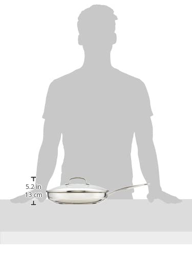 Cuisinart skillet next to spatula and plate showing 12-inch scale and versatility