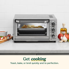 Cuisinart interior open with auto-slide rack illustrating easy removal and capacity