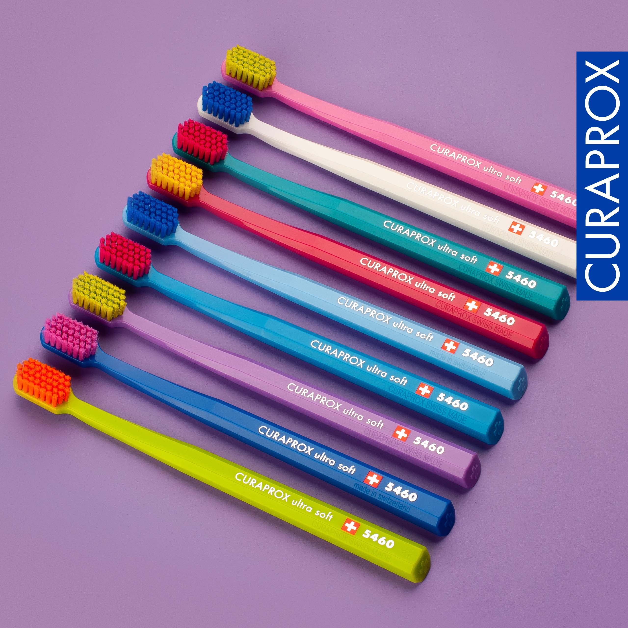 Curaprox brushes on bathroom counter with travel pouch showing portability benefit
