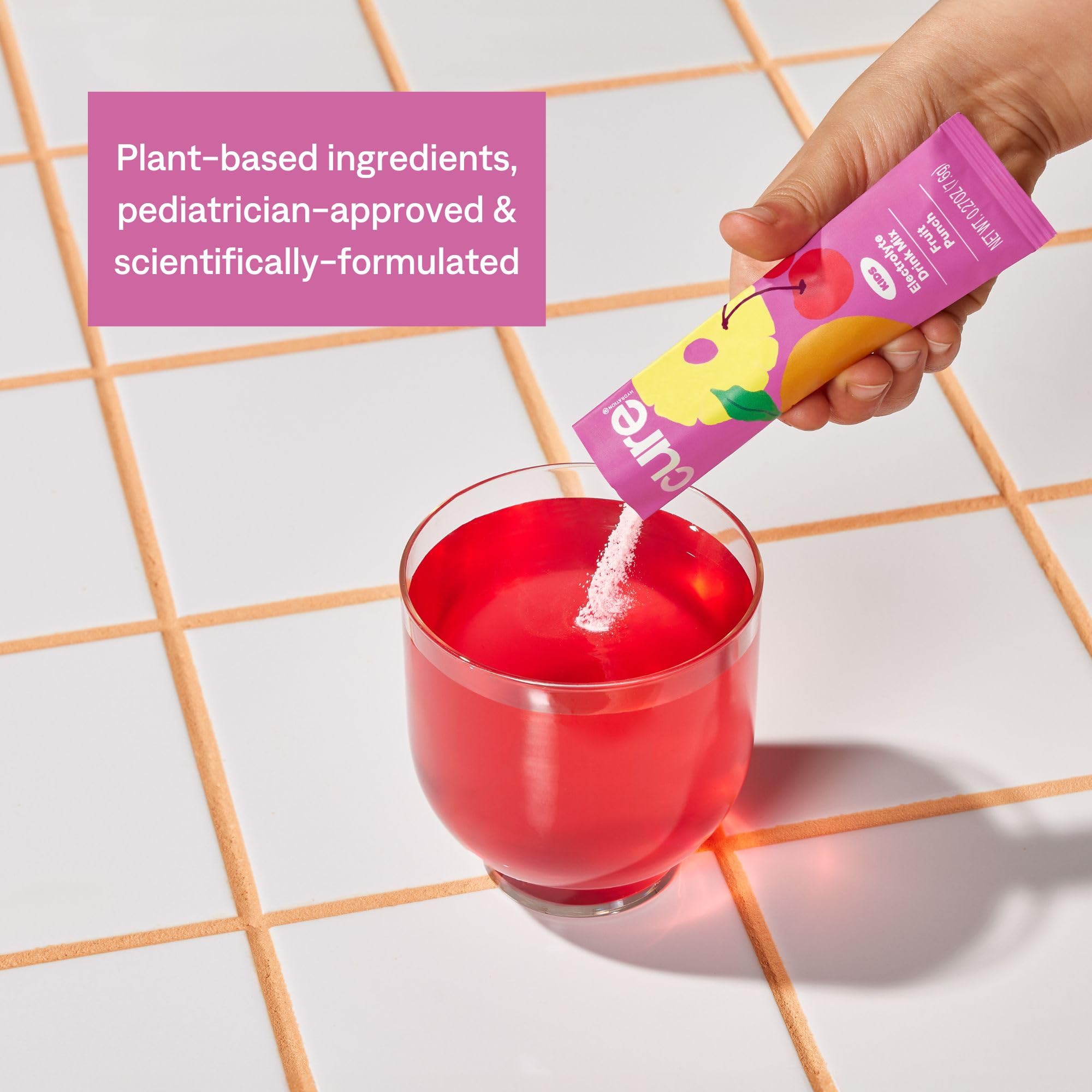 Cure Hydration powder dissolving in glass demonstrating quick mixability