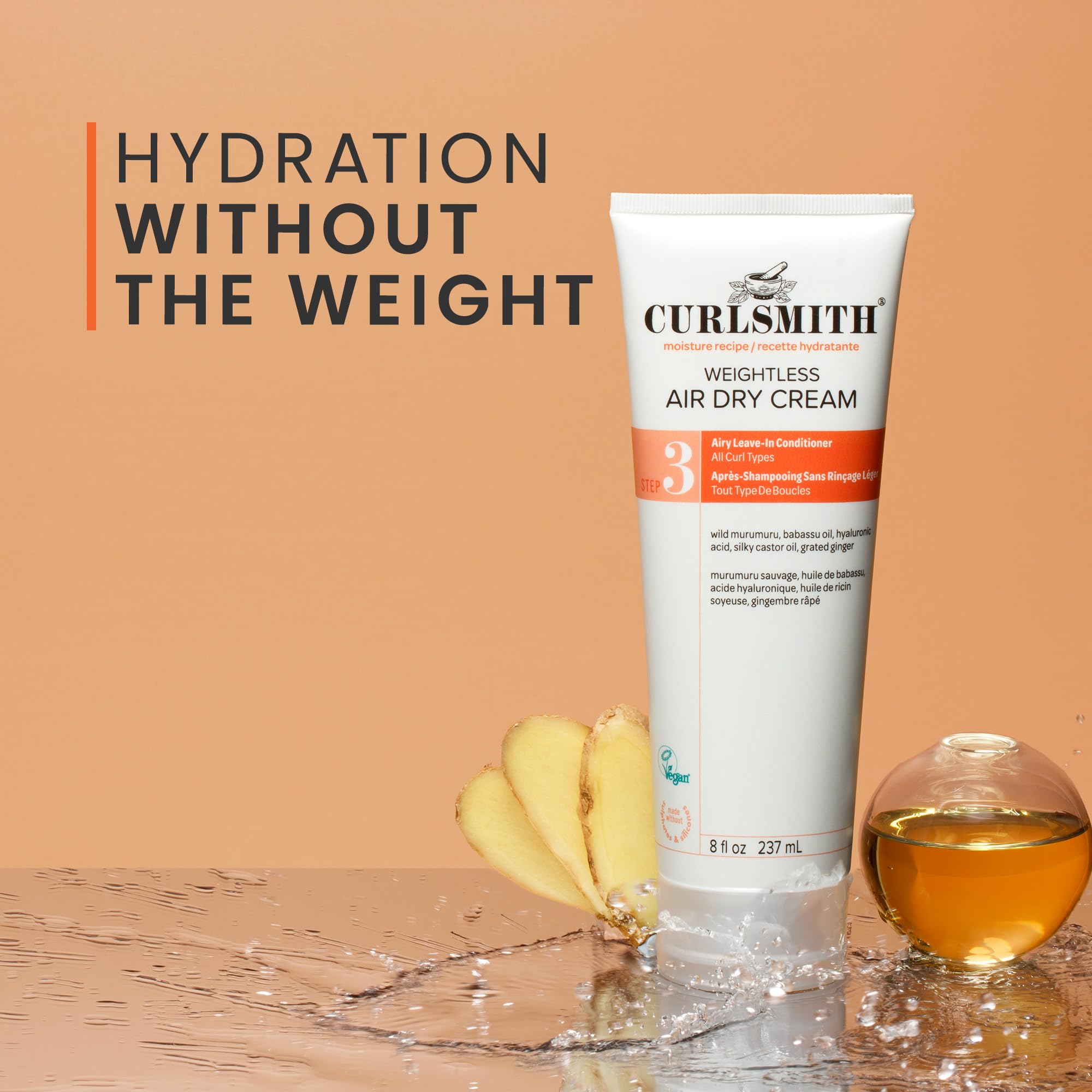 CURLSMITH applying cream to damp hair for easier styling and detangling