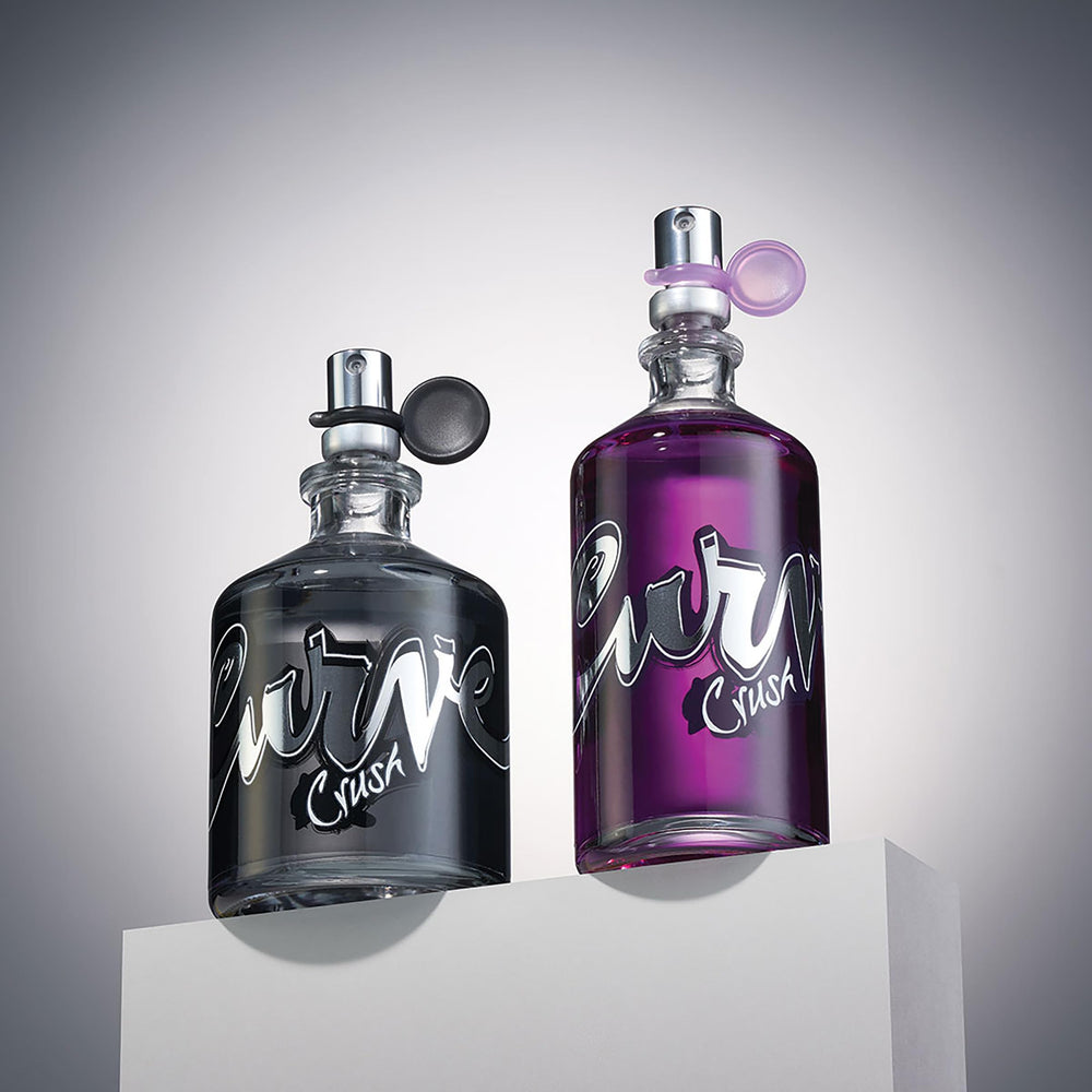 Curve Crush bottle in hand to show 4.2 fl oz size and travel convenience