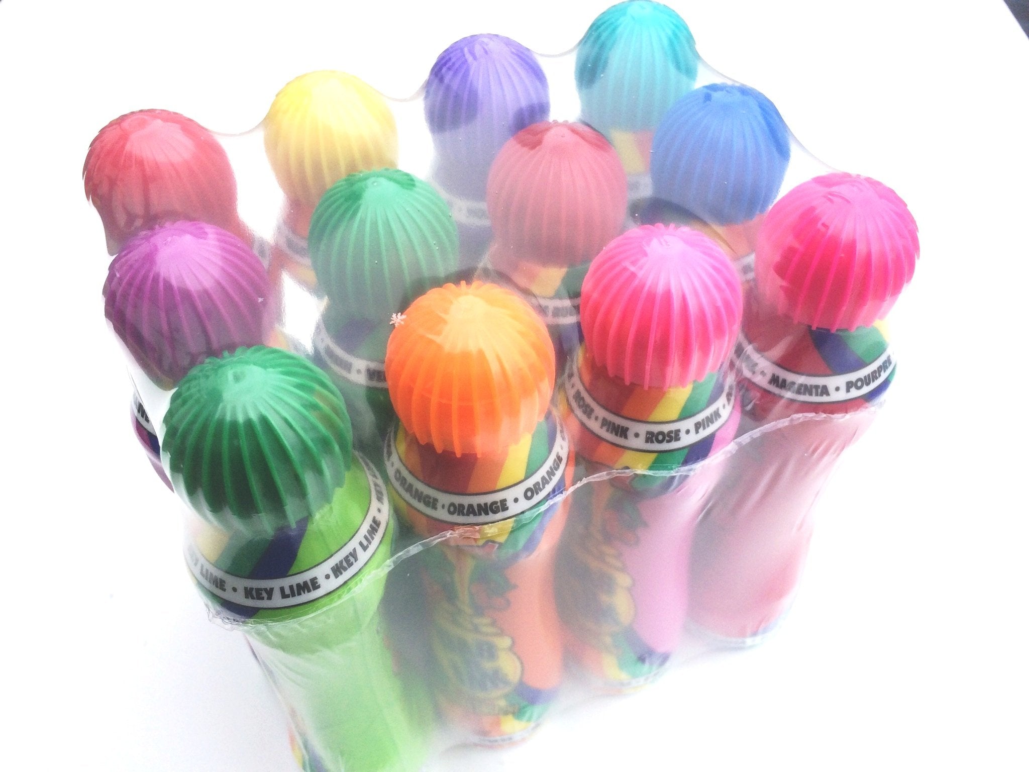 Dab-O-Ink close-up of dauber tip and ribbed cap highlighting easy-open grip and precise dots