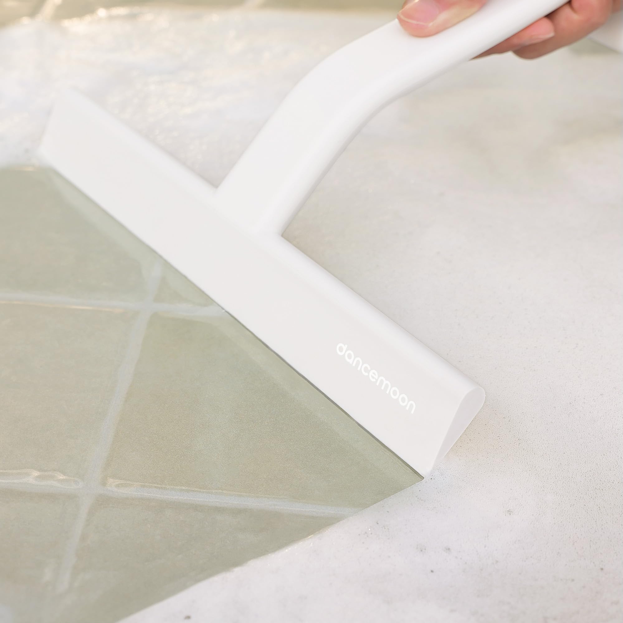 dancemoon next to ruler showing 10-inch length and balanced coverage benefit