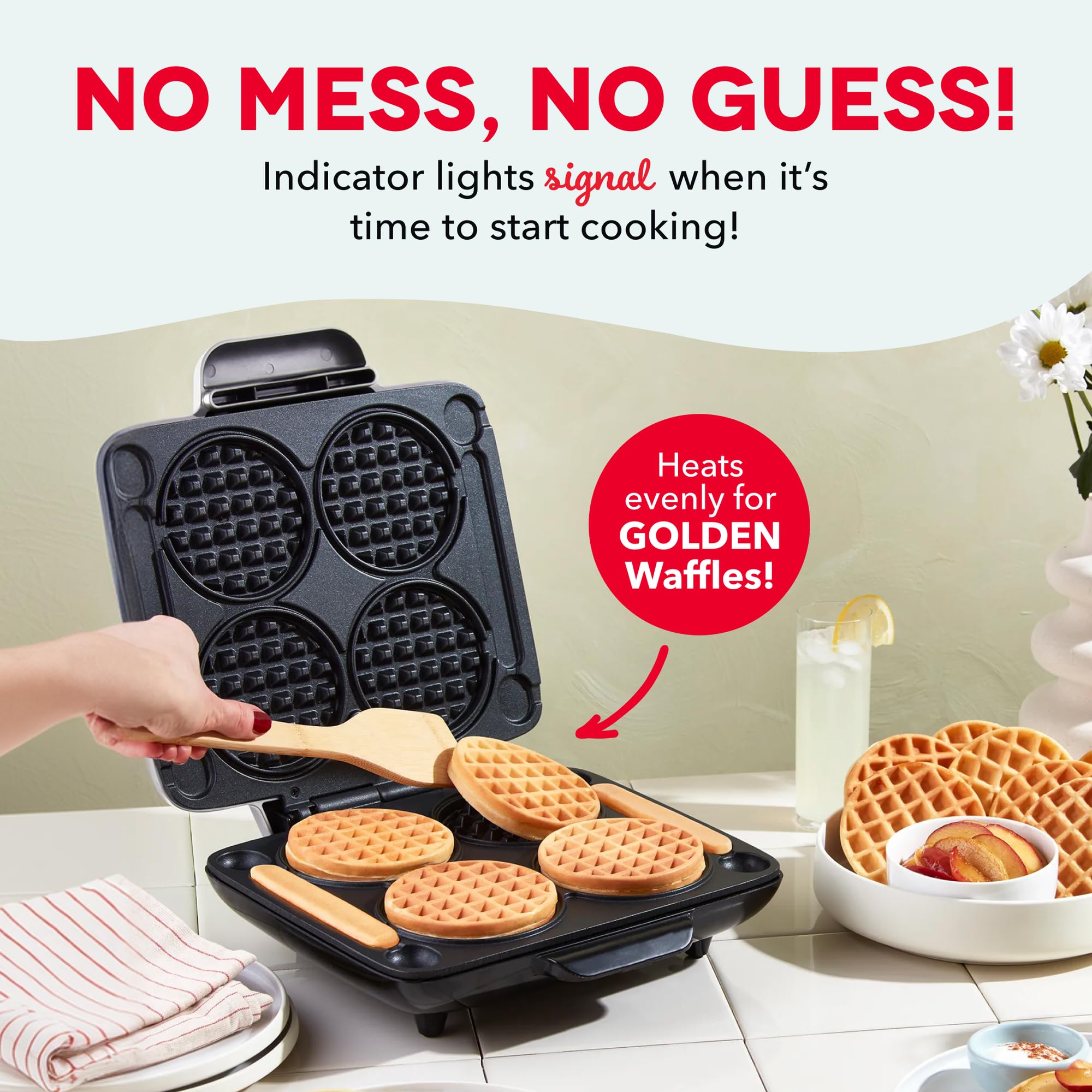 DASH waffle maker in use with server removing waffles for family breakfasts