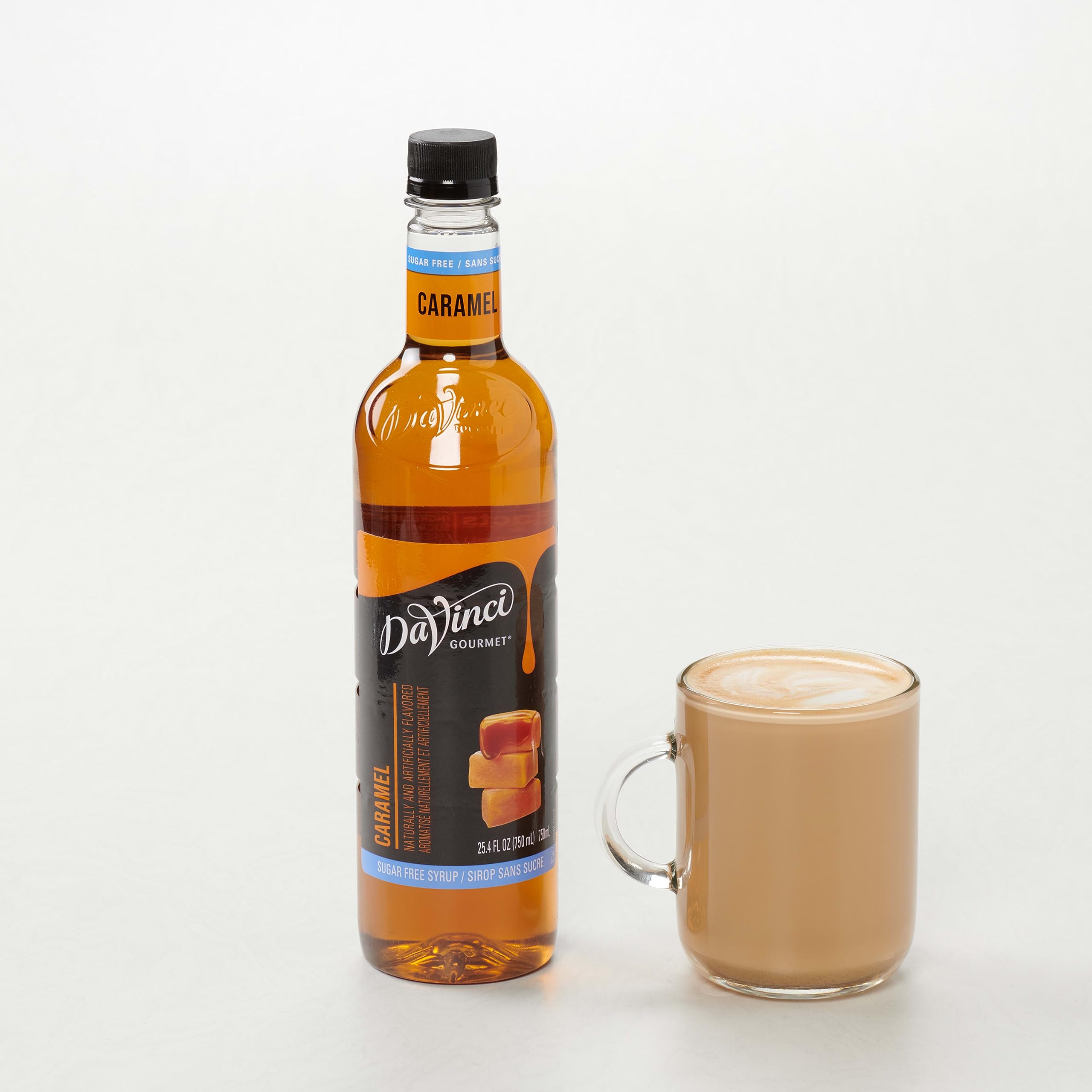 DaVinci Gourmet bottle next to coffee mug showing scale and volume benefit