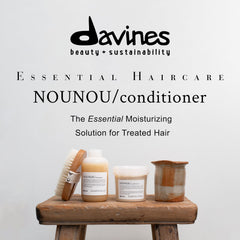 Davines NOUNOU 8.45 fl oz bottle beside ruler for size and travel planning