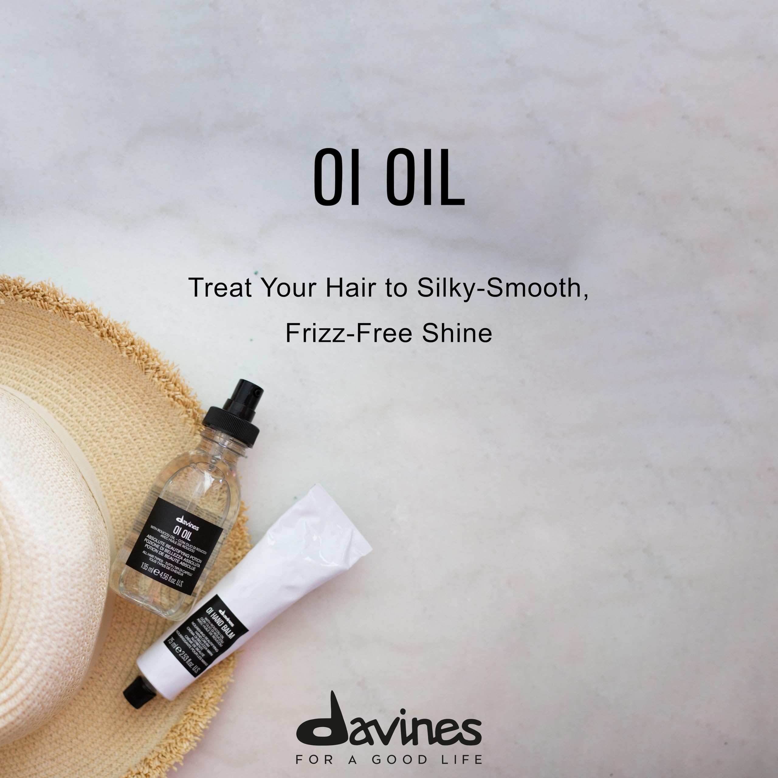 Davines OI Oil texture on palm demonstrating lightweight absorption and shine benefit
