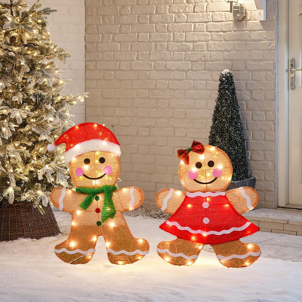 Dazzle Bright night display of lit gingerbread men, creates warm inviting glow