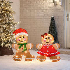 Dazzle Bright night display of lit gingerbread men, creates warm inviting glow
