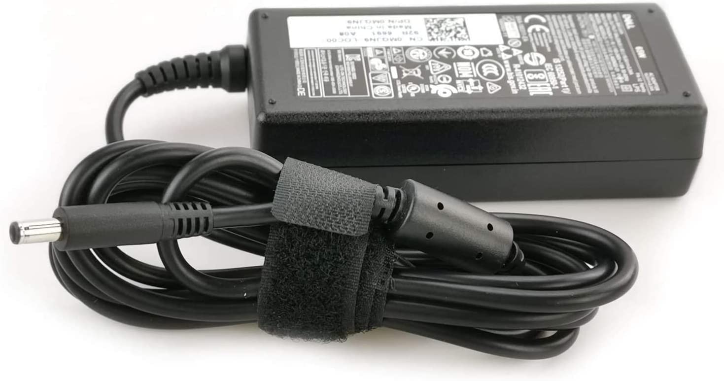 Dell charger plugged into Inspiron laptop showing consistent charging benefit