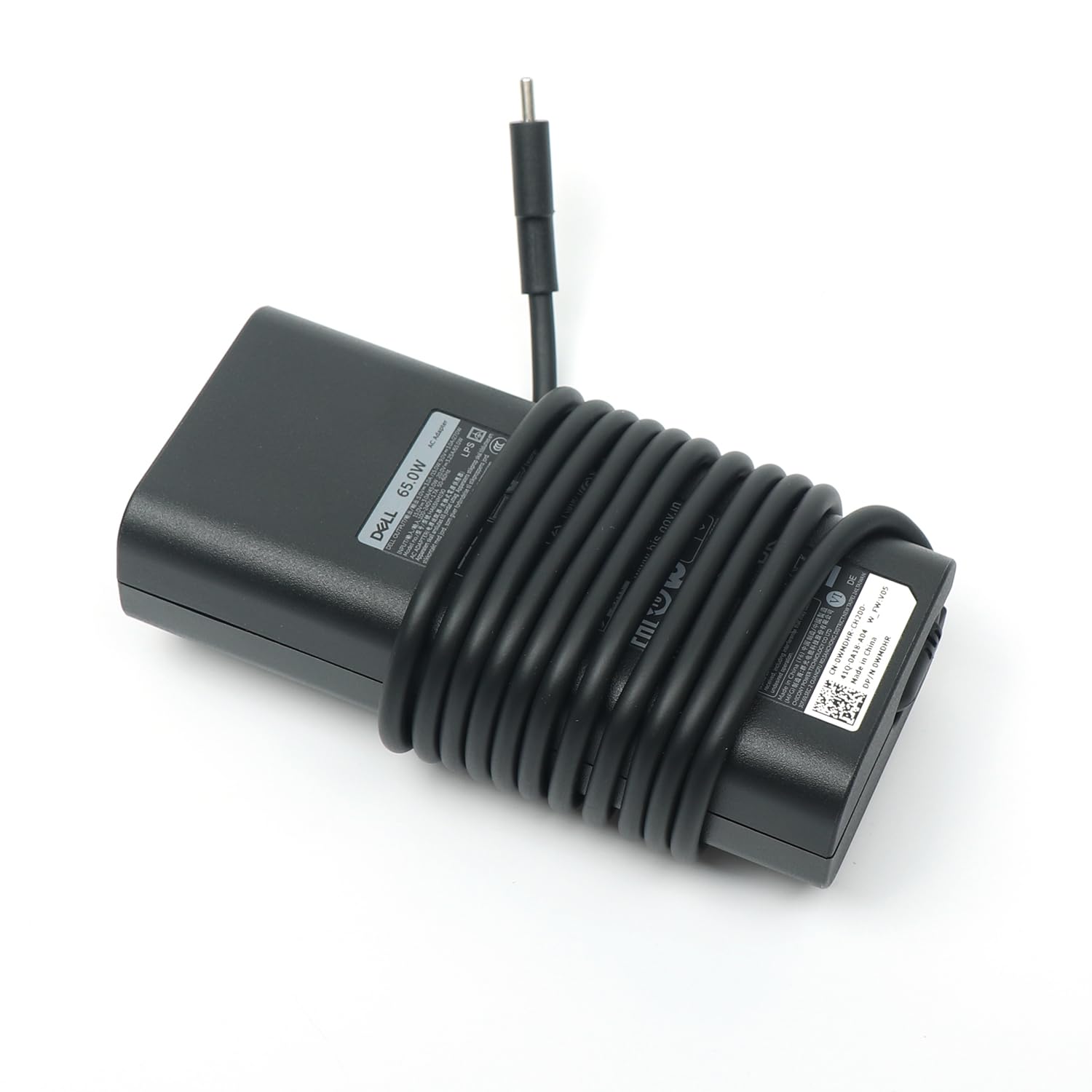 Dell adapter top label close-up showing model HA65NM190 and safety info