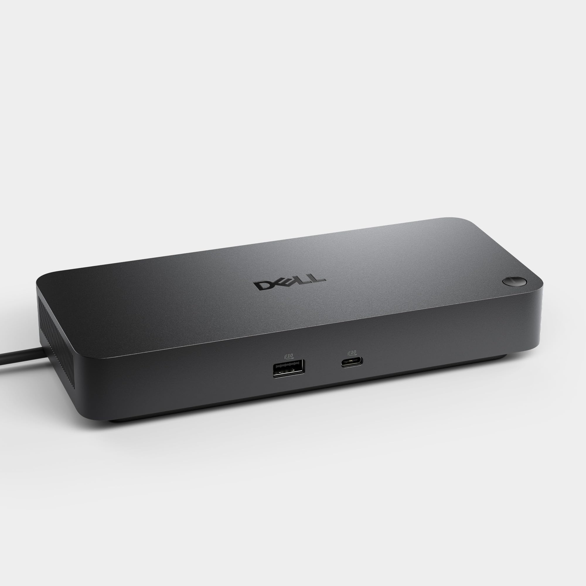 Dell WD25 beside accessories to show scale and desktop integration advantage