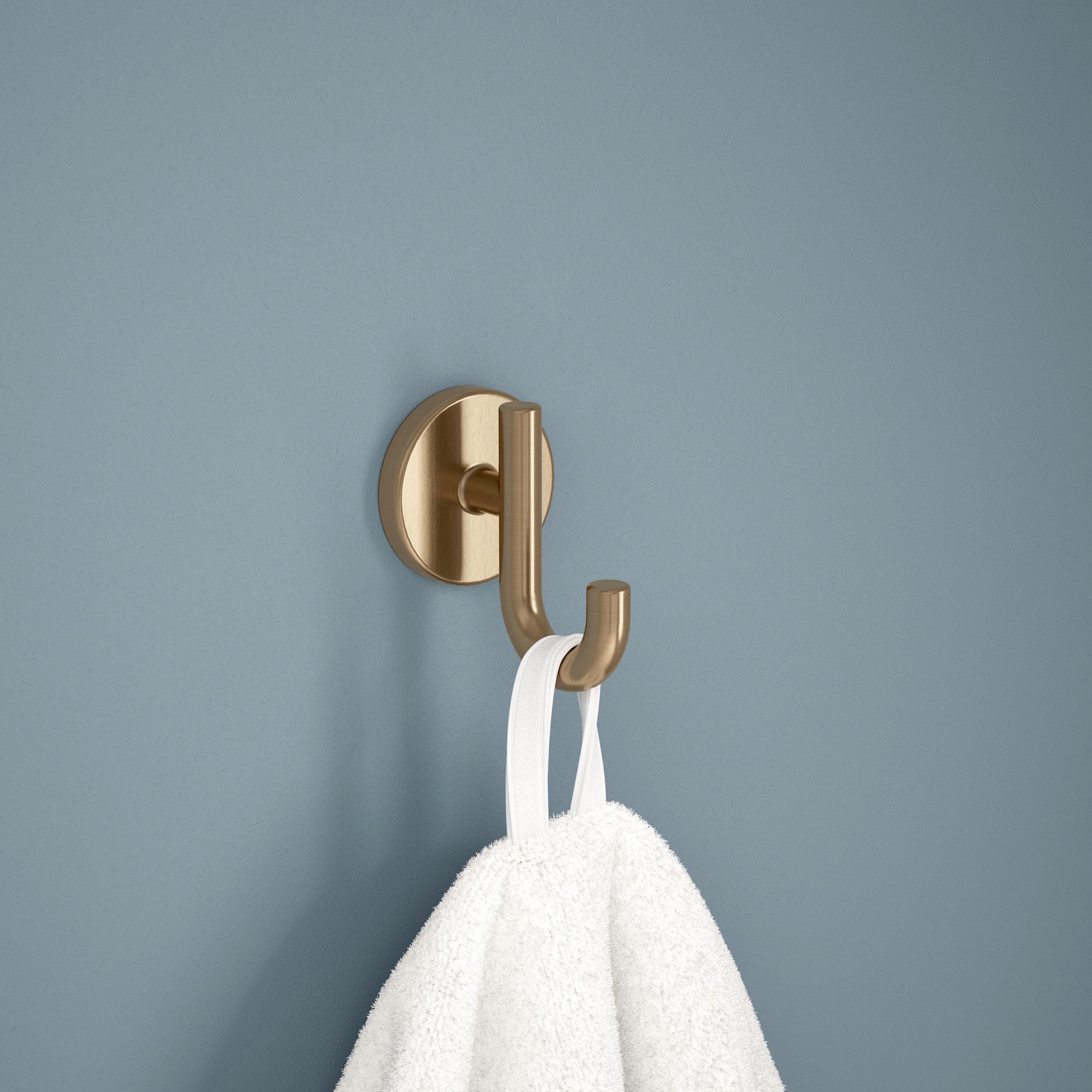 Delta close-up of champagne bronze finish highlighting brushed texture and durability