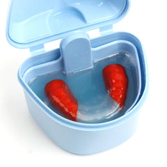 DentaSOAK solution with retainer soaking in cup demonstrating quick 15-minute cleaning benefit