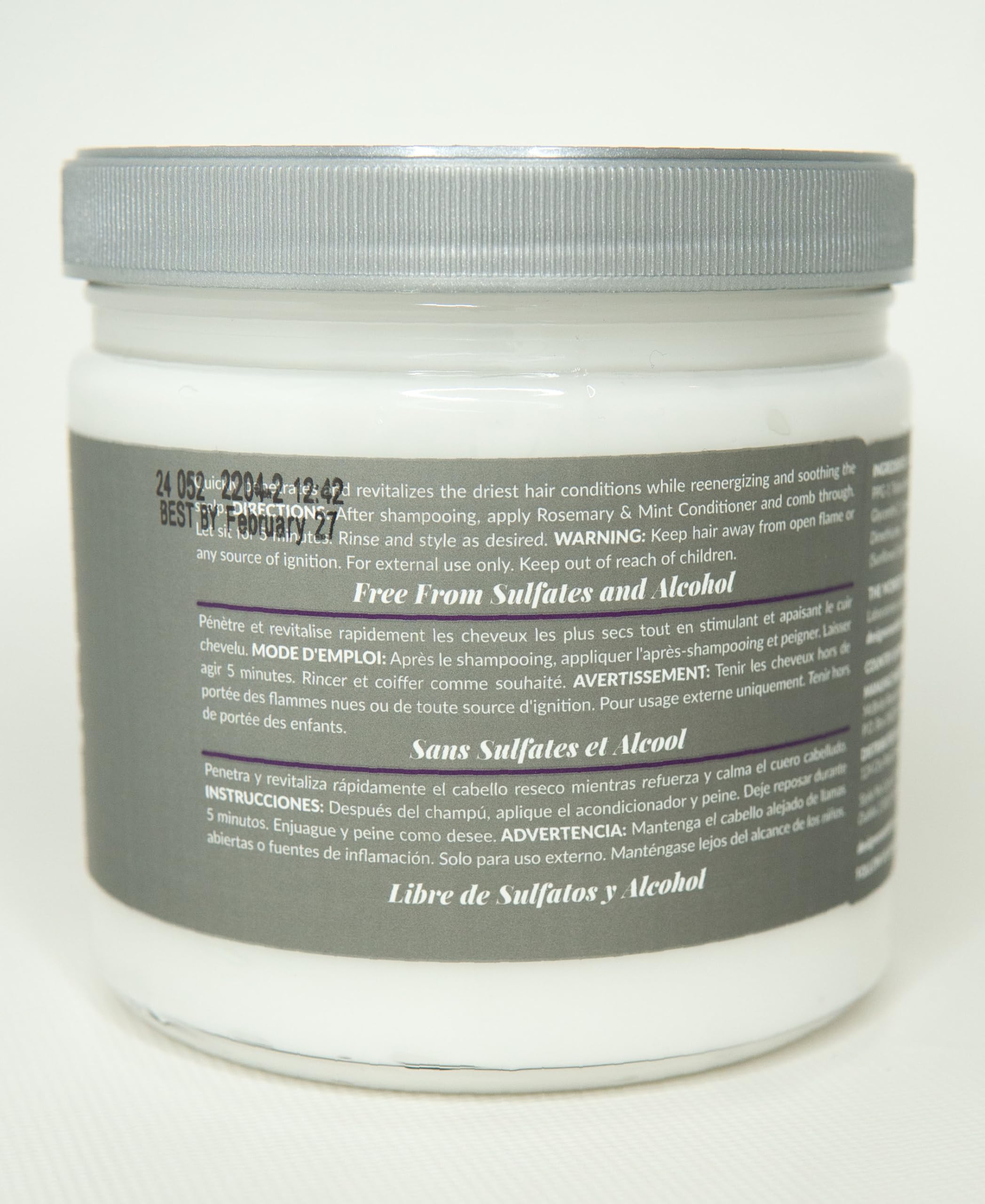 Design Essentials conditioner on hand ready to apply for detangling benefit