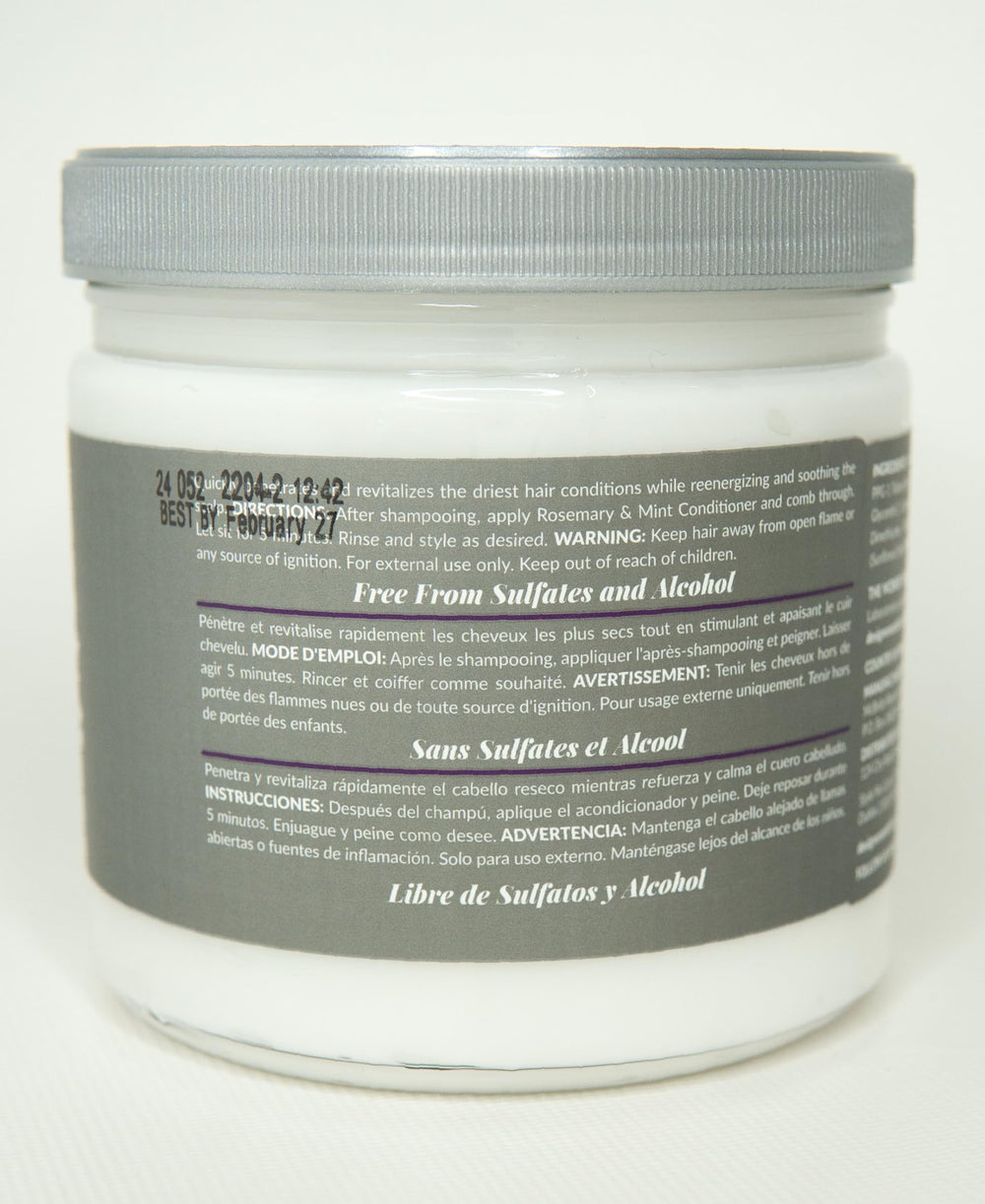 Design Essentials conditioner on hand ready to apply for detangling benefit