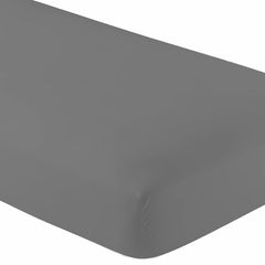 DESTINY CRESCENT flat sheet spread across bed illustrating smooth coverage and clean dark grey look