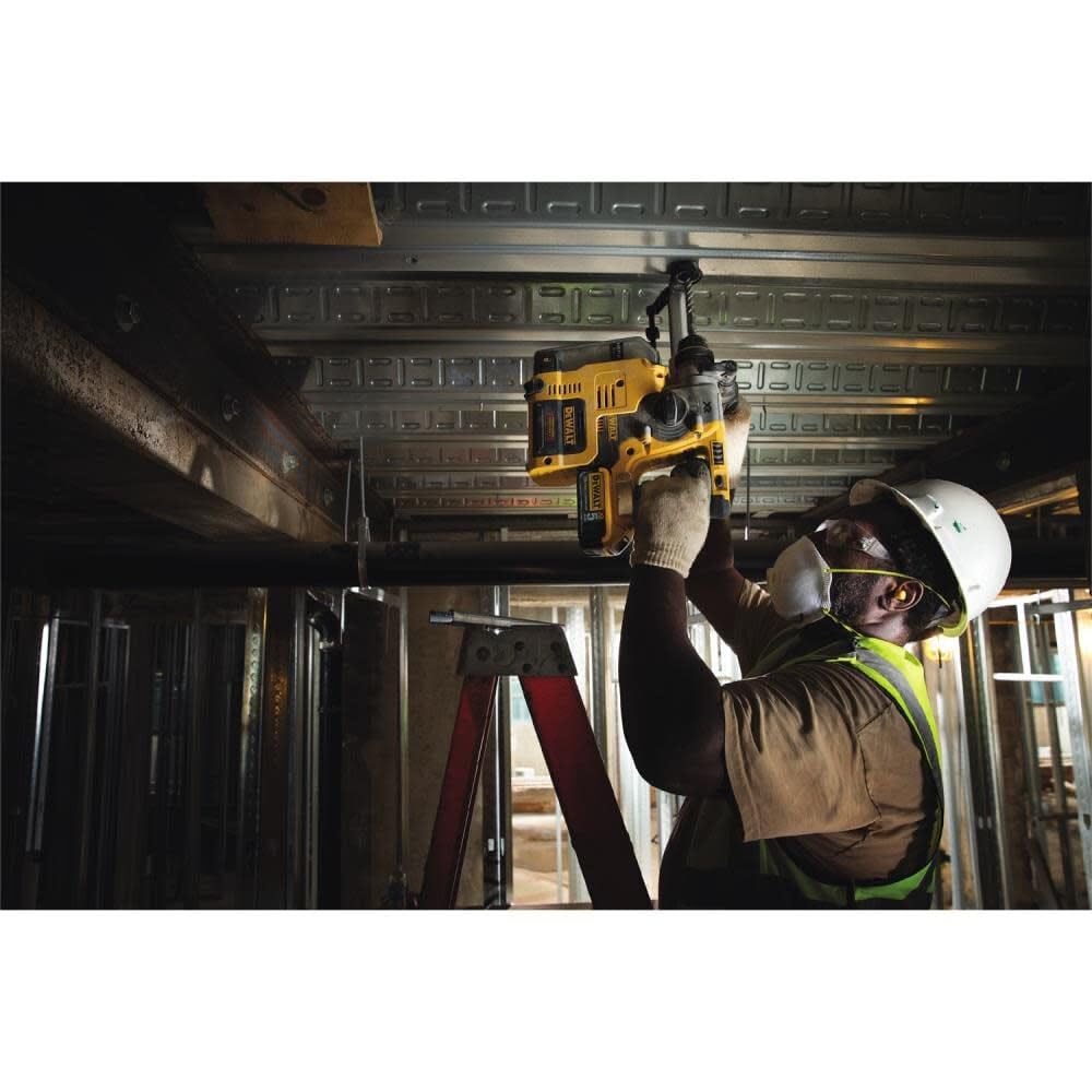 DEWALT DCH273B in use drilling concrete demonstrating efficient masonry performance