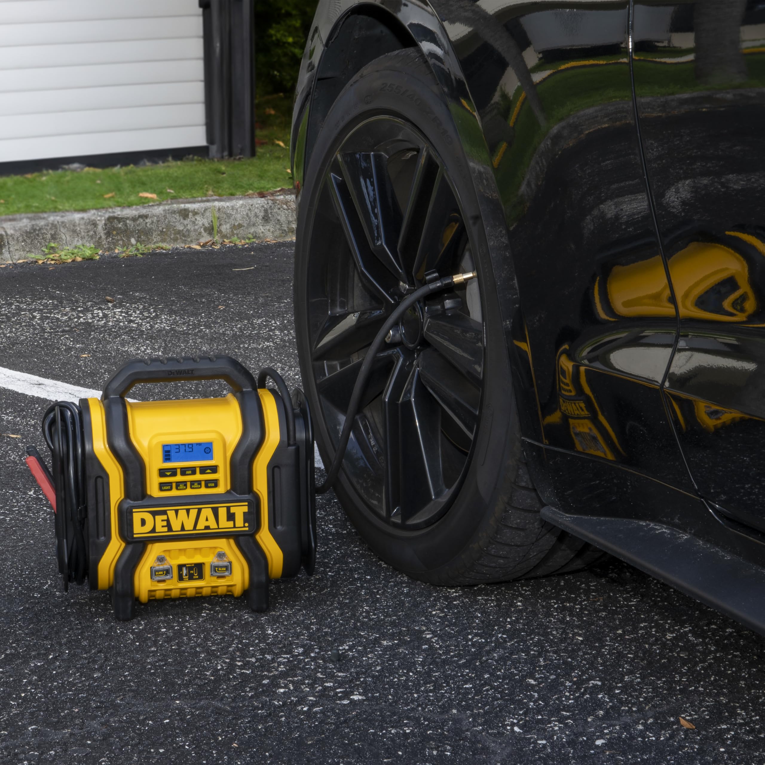 DEWALT DXAEPS14 LED work light in use illuminating a dark repair area for better visibility